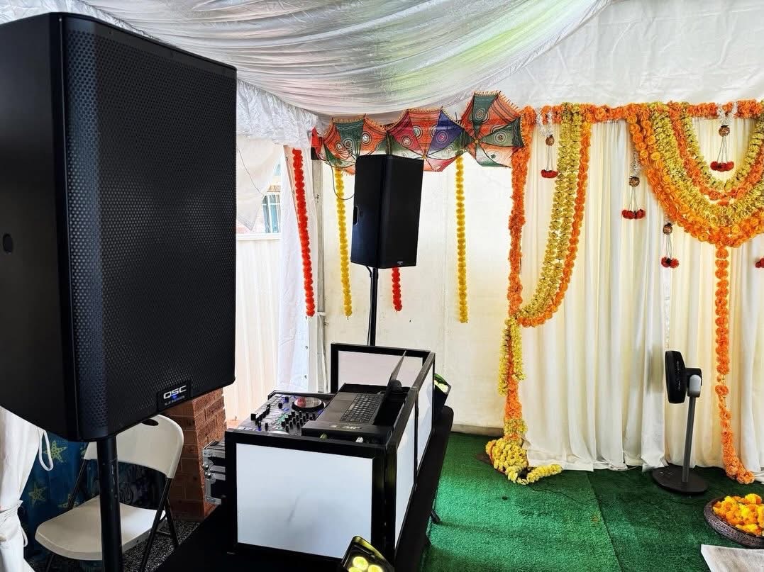 DJ speaker setup at a decorated cultural event